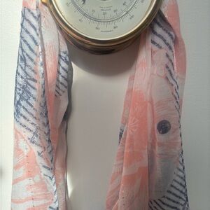 Mia & Tess scarf with a pink and blue floral and striped pattern.
